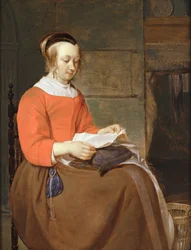 Een jonge vrouw zittend in een interieur, een brief lezend